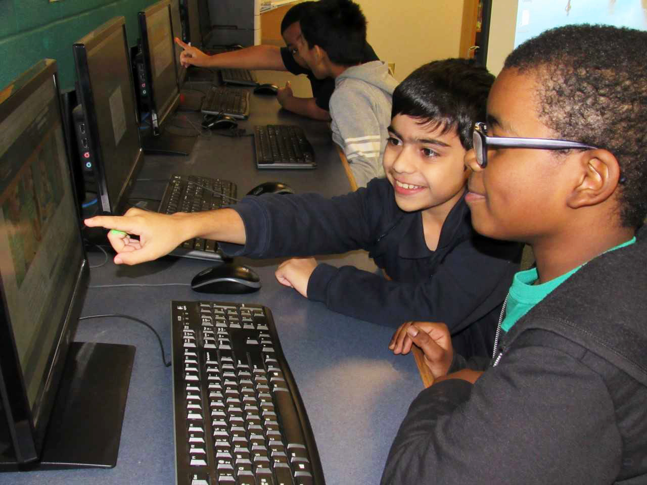 boys pointing to screen RL Renzulli Learning Benefits